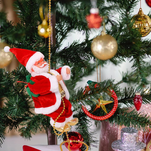 Muzikinis laipiojantis Kalėdų Senis – judanti dekoracija, magijai namuose